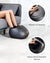 A woman is sitting on a couch, enjoying a relaxing foot massage from a Renpho Shiatsu Foot Massager Premium.(A)