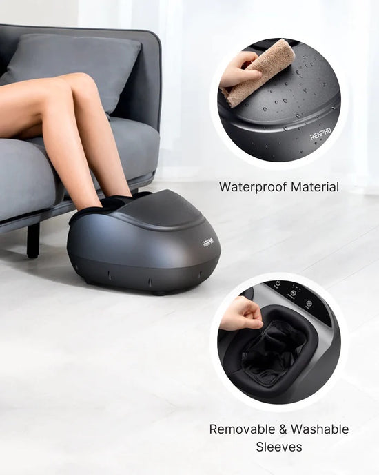 A person sitting on a couch is using the Renpho Shiatsu Foot Massager Premium for deep kneading foot massage and pain relief. The device is shown with labels highlighting its features: "Waterproof Material" with a hand wiping the massager and "Removable & Washable Sleeves" displaying the interior sleeve being removed.