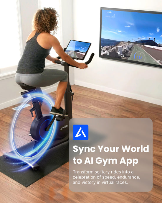 A woman rides a Renpho UK's AI Smart Bike S in a bright room with a large window. She faces a wall-mounted screen displaying a cycling route, engaging in personalized AI courses. Text overlaid reads: "Sync Your World to AI Gym App. Transform solitary rides into a celebration of speed, endurance, and victory." The AI Gym logo is present.