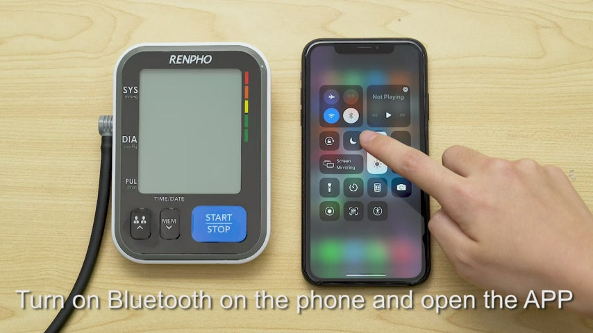 A Renpho smartphone with a Renpho Blood Pressure Monitor and batteries. (A)