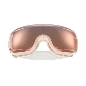 A front view of the sleek Renpho Eyeris 3 Rosé Eye Massager with a reflective rose-gold lens. The device features a light beige frame and a partially visible white adjustable strap, offering a seamless and modern appearance that also promotes eye care. (A)